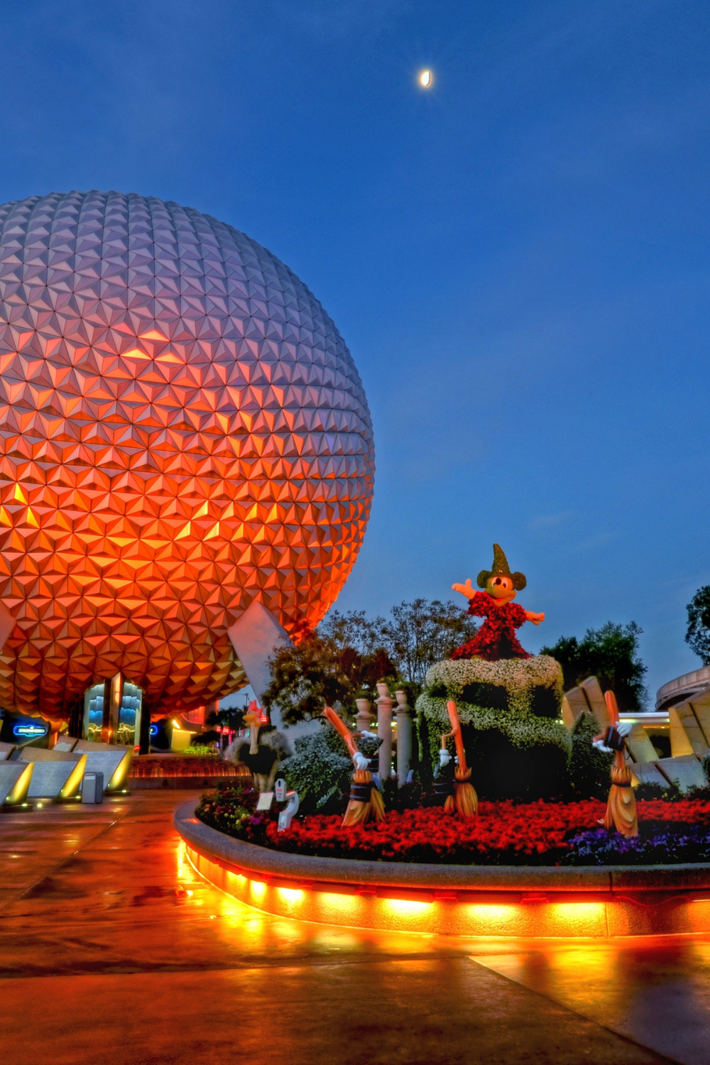 Cover image for blog post on Epcot Instagram captions - it features a evening shot of Epcot